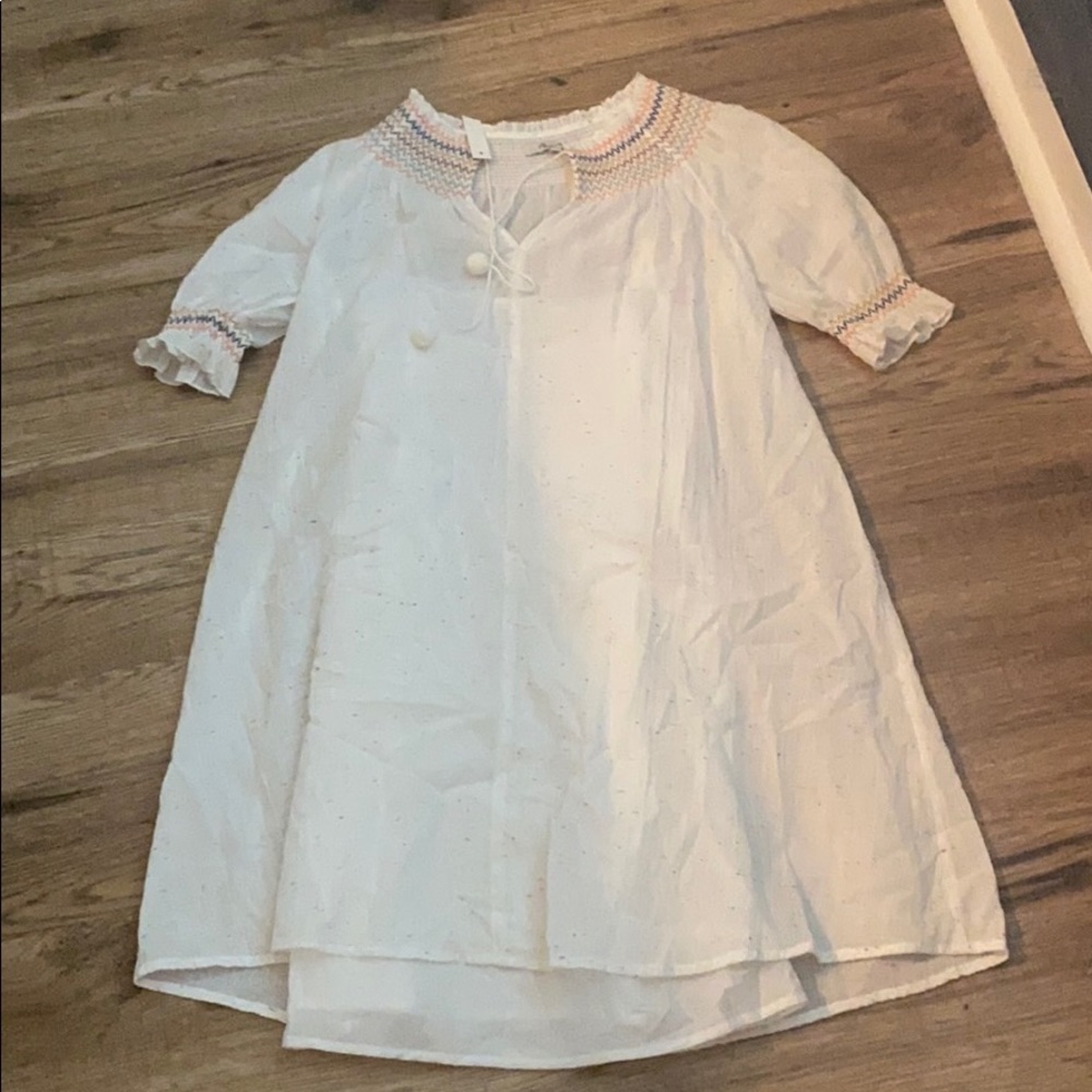 Madewell white with speckled dots. Never worn.
